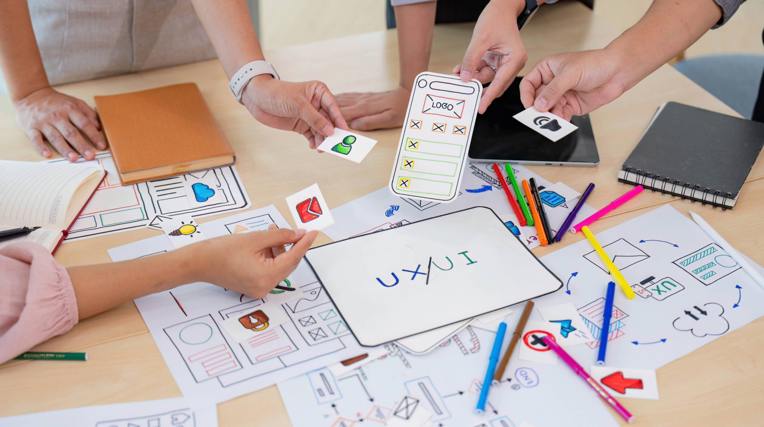 professionals from a ui ux design company in bangalore working together