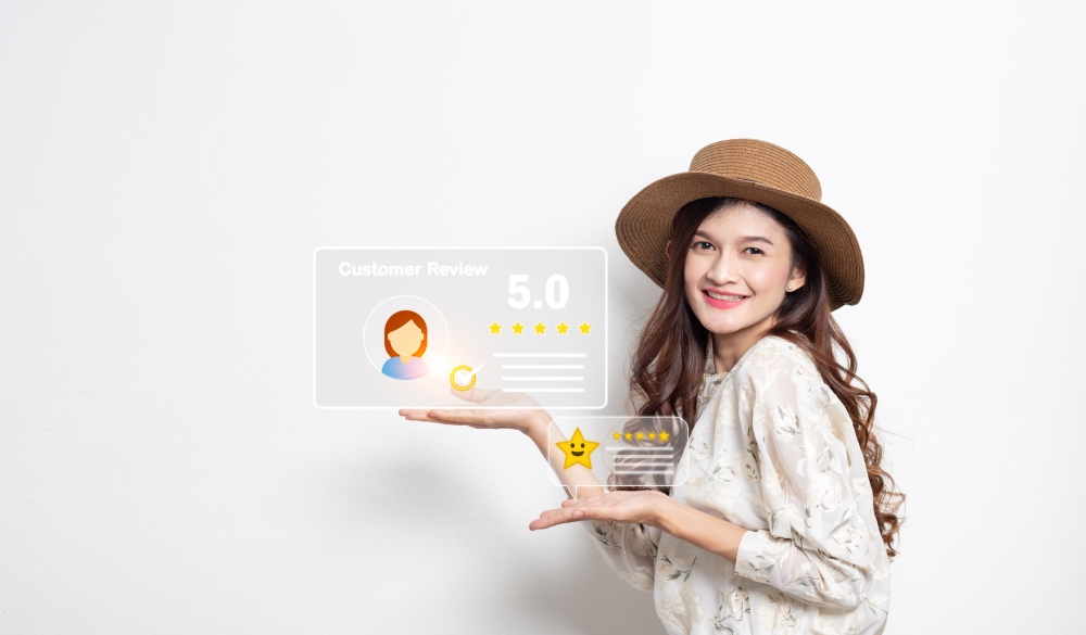 A girl showing virtual screen displaying customer review 