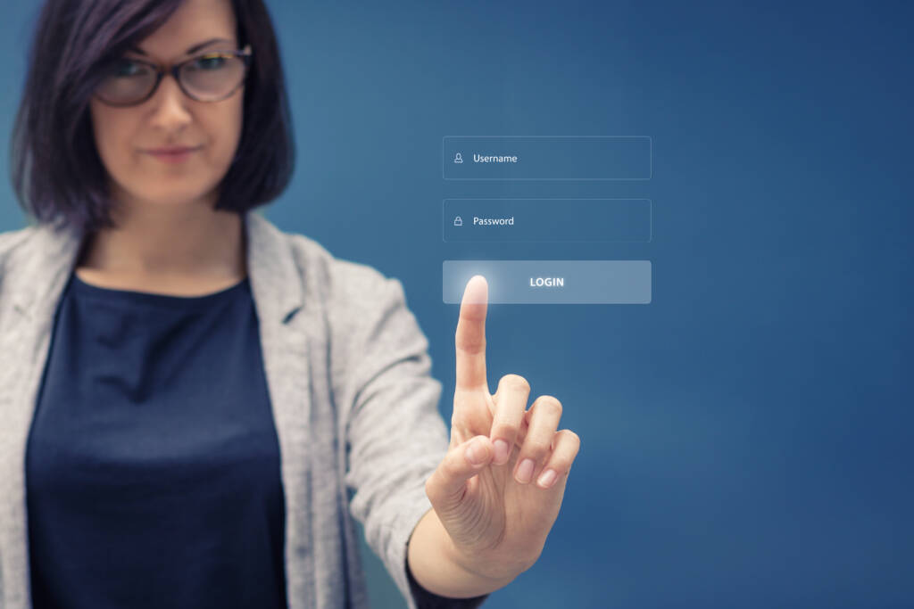 A woman clicking login button by Gesture-Based Navigation