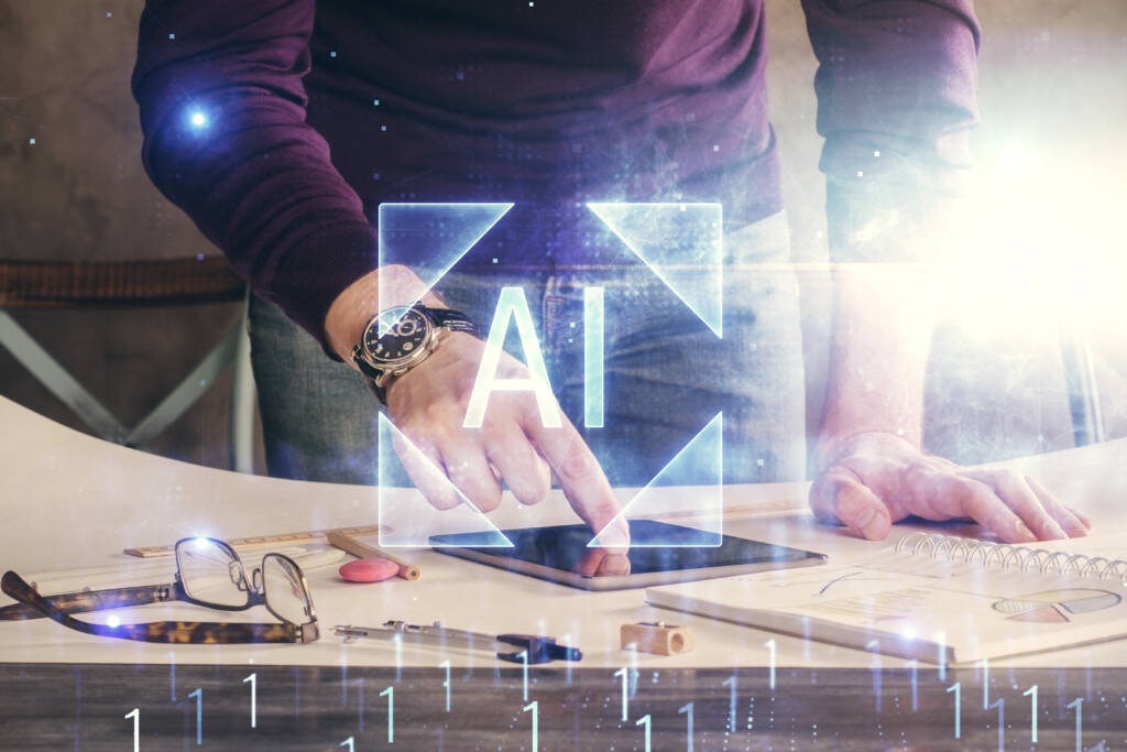 Double exposure of a man hand holding and using a digital device