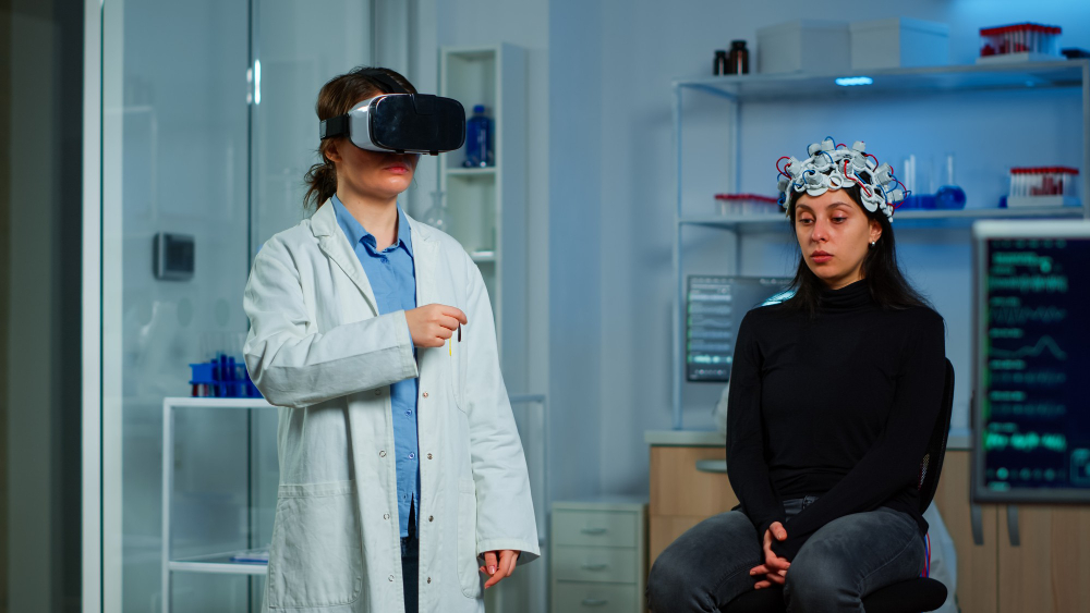 Researcher in VR glasses analyzes patient brain scans