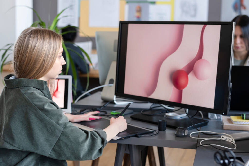 A female designer working on her desk