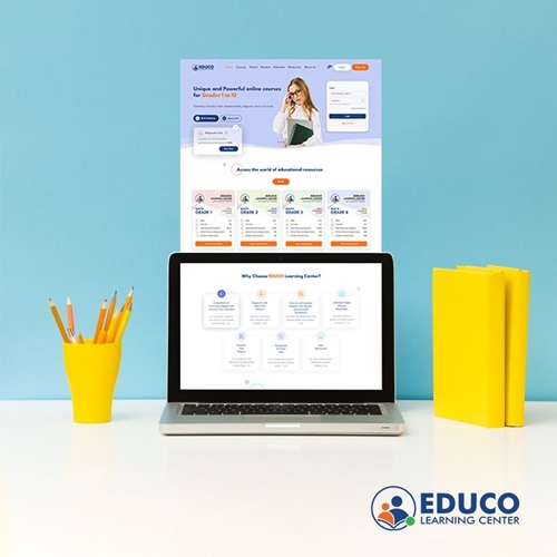 Educo Learning center screen on laptop near note book and pen stand