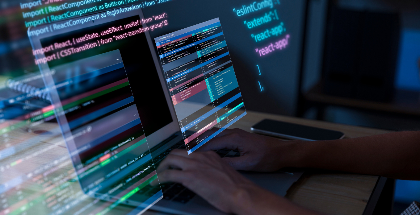 Someone doing coding on laptop
