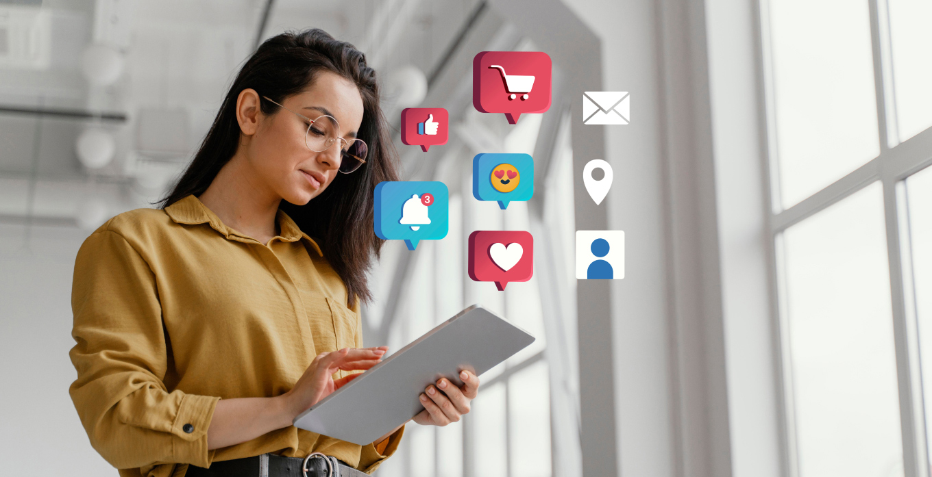 Lady with googles browsing on tab with ecommerce icon floating