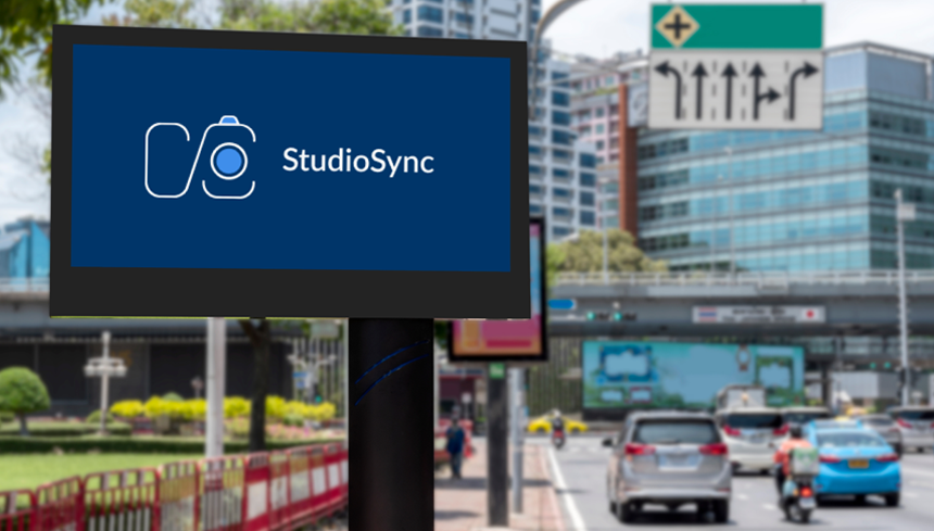Studiosyn banner on hoarding on road side